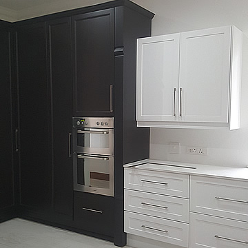 Classic Kitchen - Black & White Combination with Semi Solid Wood and white Duco Shaker Profile Door